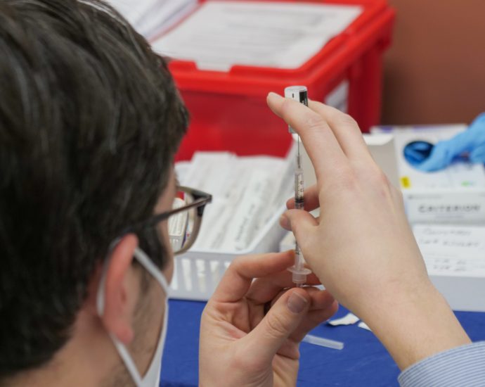 Pharmacist prepares Covid-19 vaccine