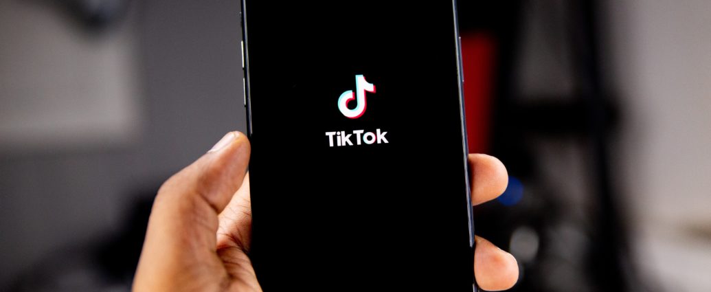 Person holding an Iphone running Tiktok