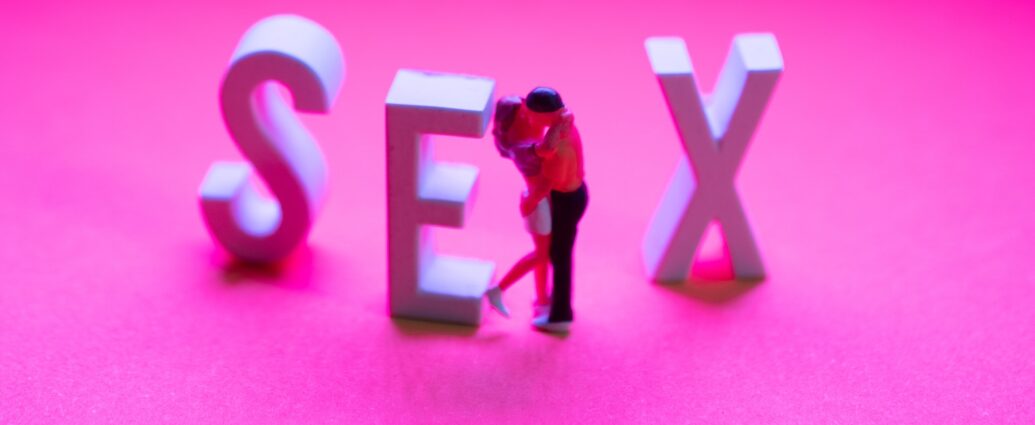 Pink background with the word 'sex' and two people kissing