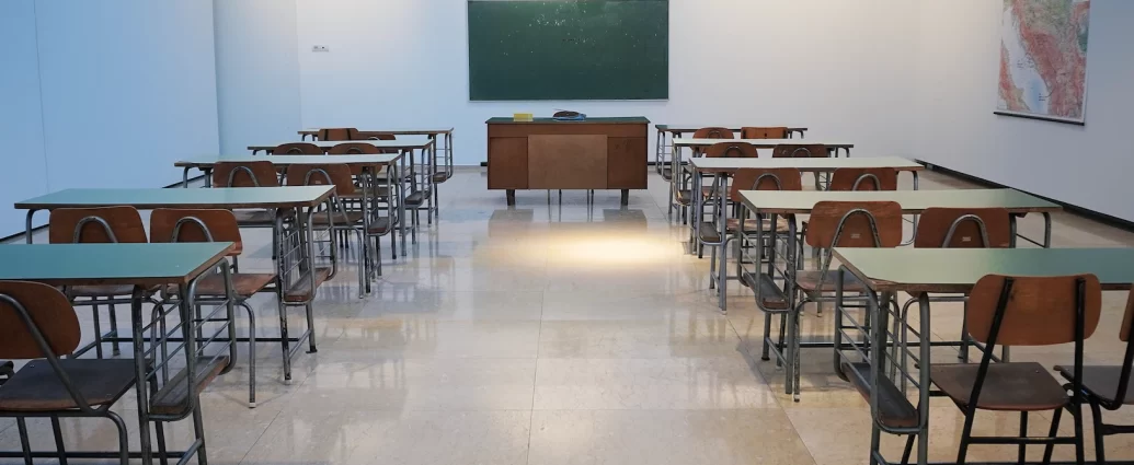 row of desks in classroom