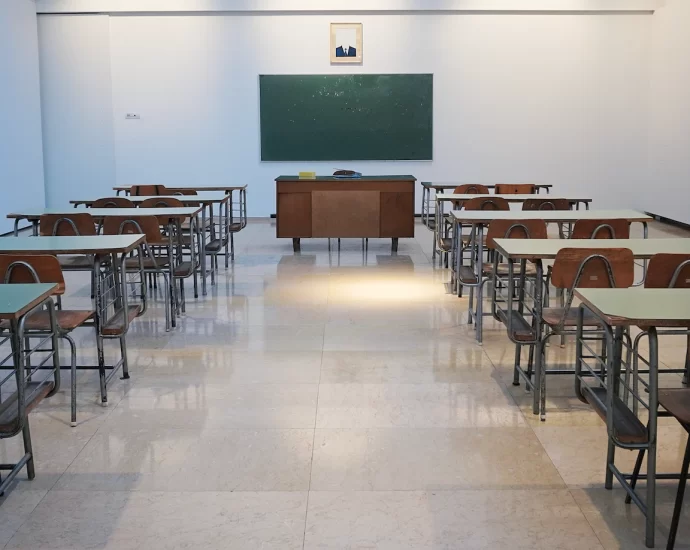 row of desks in classroom