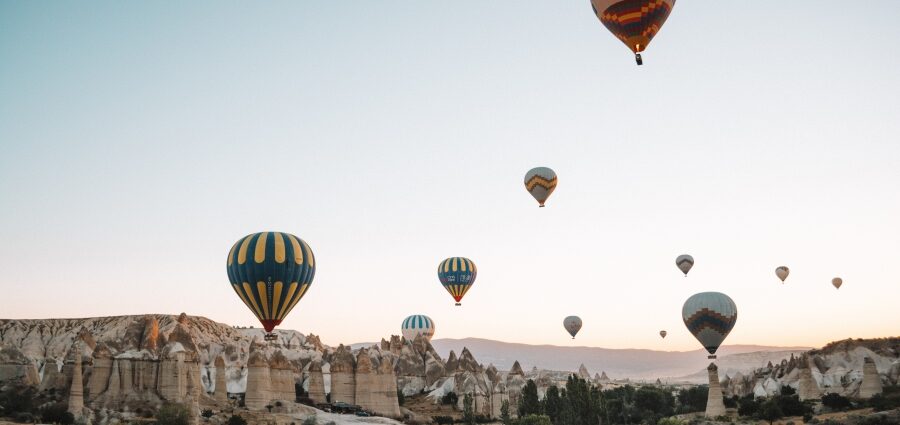 Image of Turkey hot air balloons and village