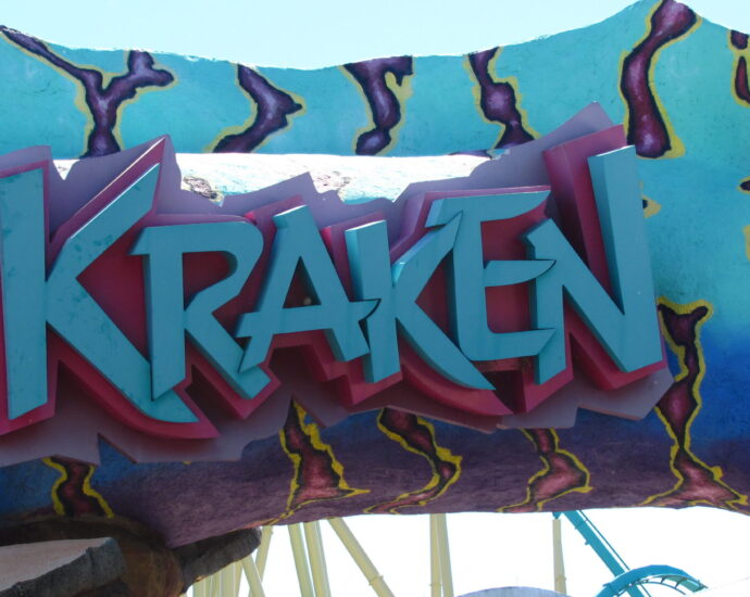 A sign reading 'Kraken' in big blue letters