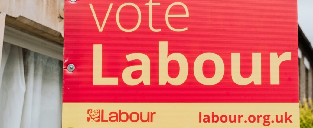 A political banner displaying 'vote Labour'.