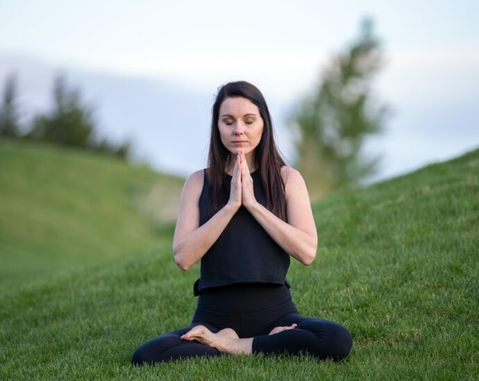 A woman practicing Vipassana meditation