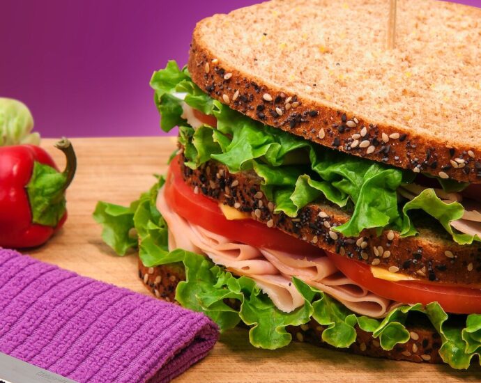 Image shows a sandwich on a table.