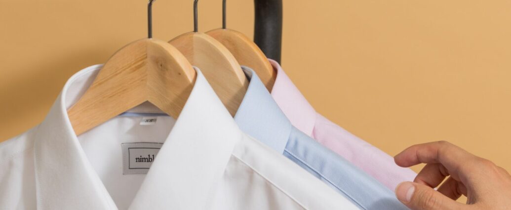 Image shows a railing with work clothes hanging on it