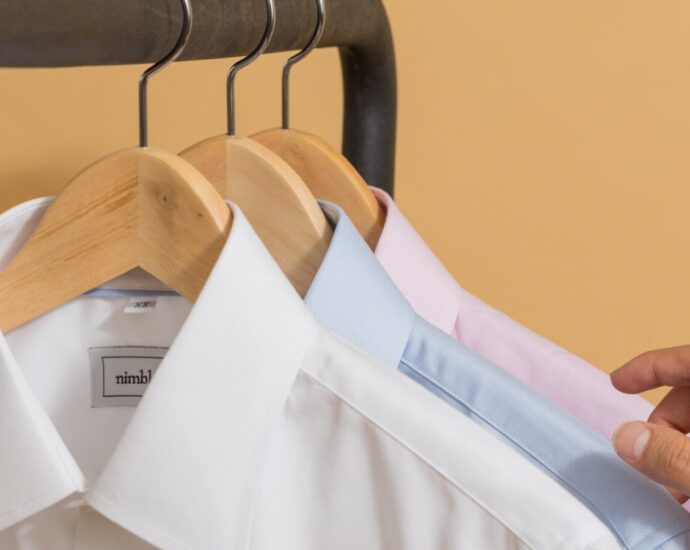 Image shows a railing with work clothes hanging on it