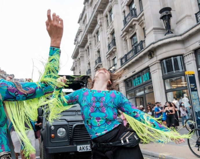 Two women partying on the street