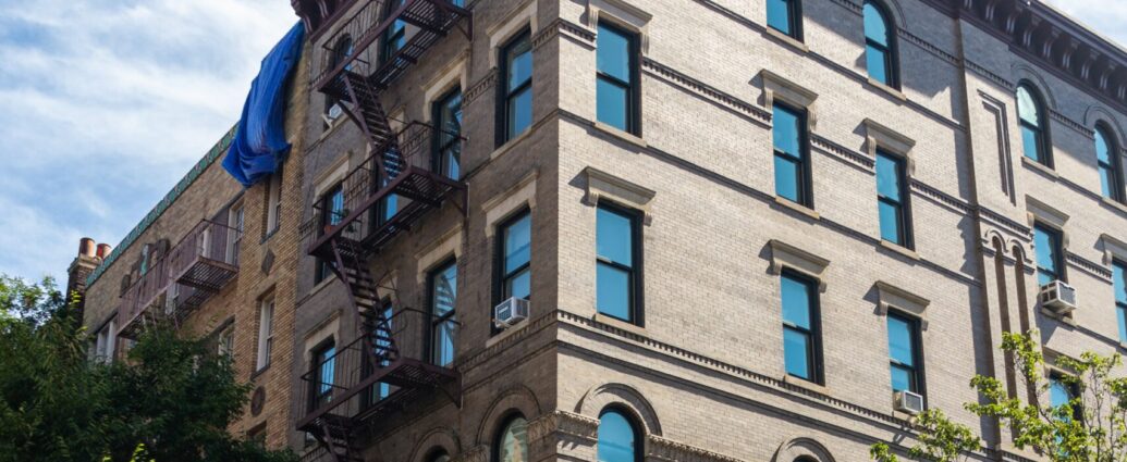 beige apartment block again blue sky. Known from TV show friends.