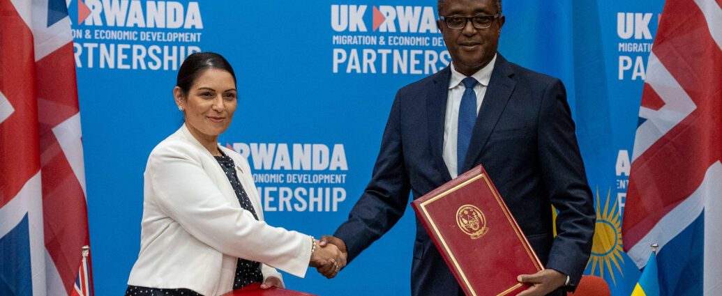 Ex-Home Secretary Priti Patel and Minister Biruta sign the migration and economic development partnership between the UK and Rwanda.