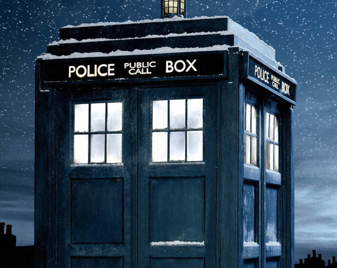 Image shows the TARDIS against a nighttime backdrop.