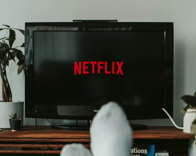 Image shows television screen that reads 'Netflix' [movie night treats]