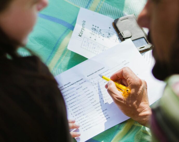 Two people bond over learning a language.