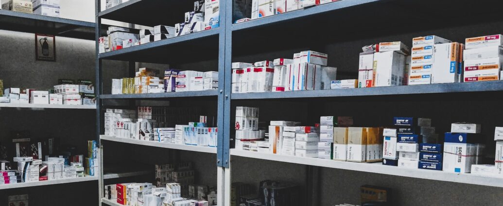 Image of medicines on shelves in a NHS pharmacy under new scheme.