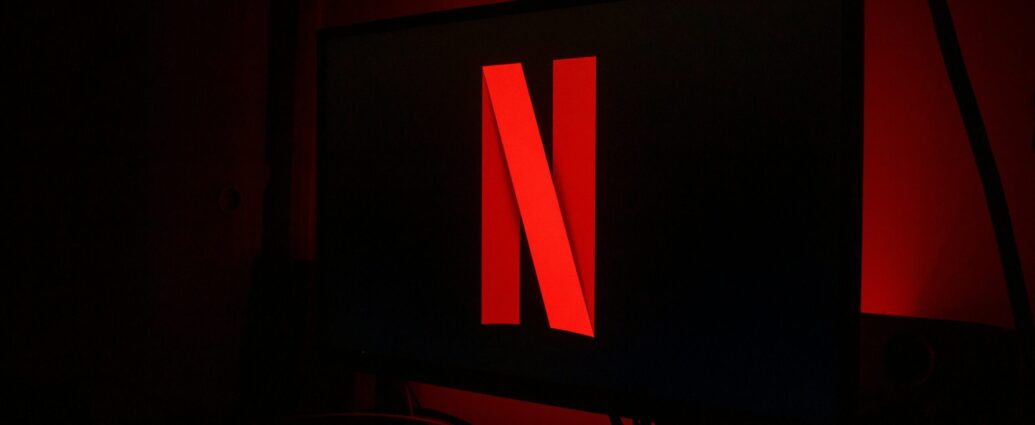 Black tv screen with red Netflix logo. Netflix's One Day