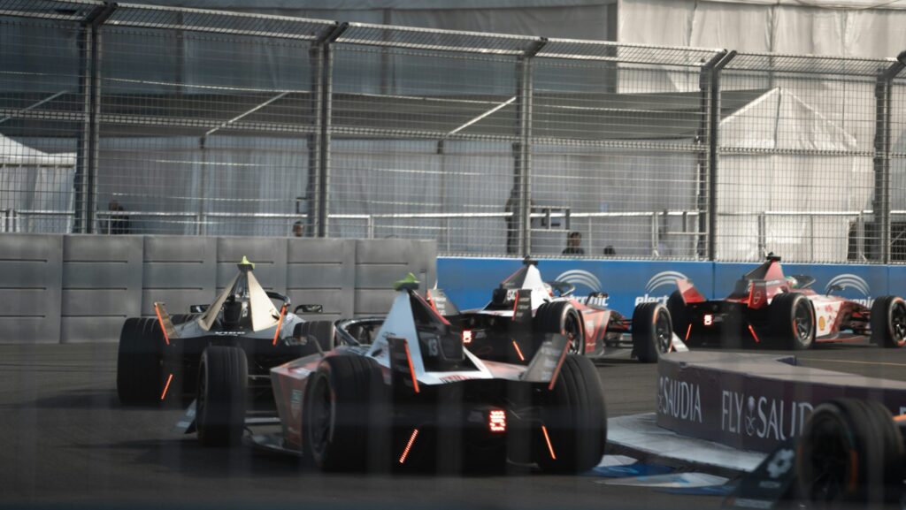 Image shows Formula E cars.