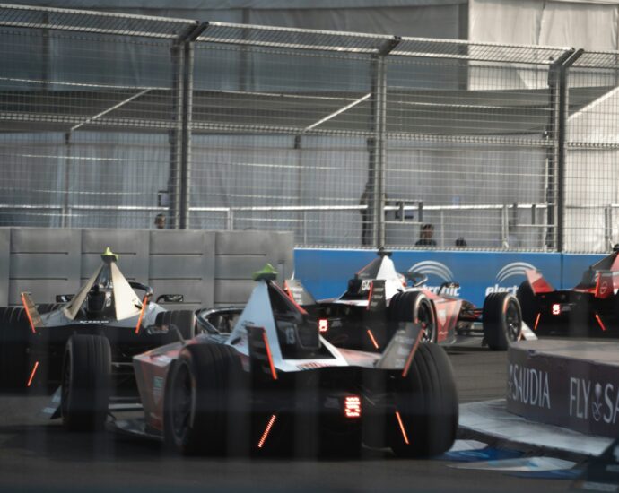Image shows Formula E cars.