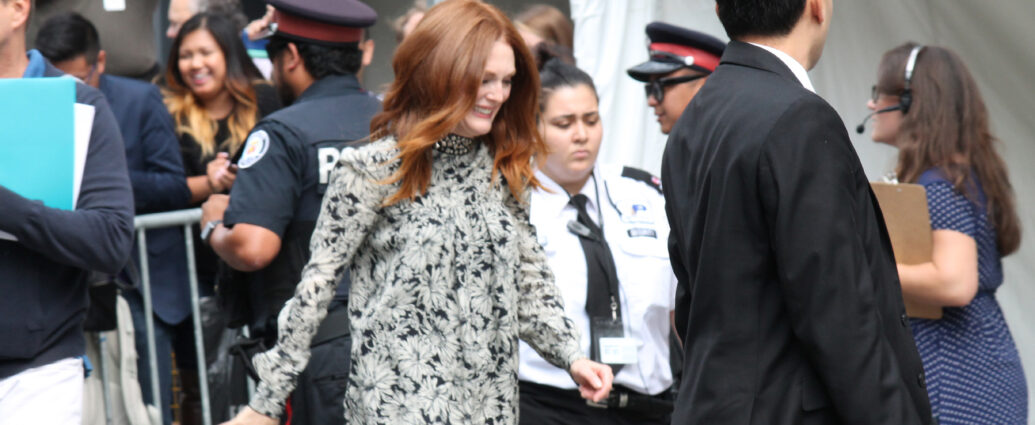 Actress Julianne Moore leaving a press conference at TIFF [May December]