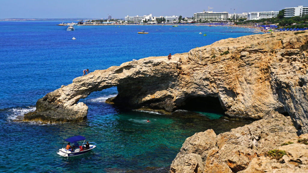 The Cypriot coastline with rocky shores and clear blue seas.
