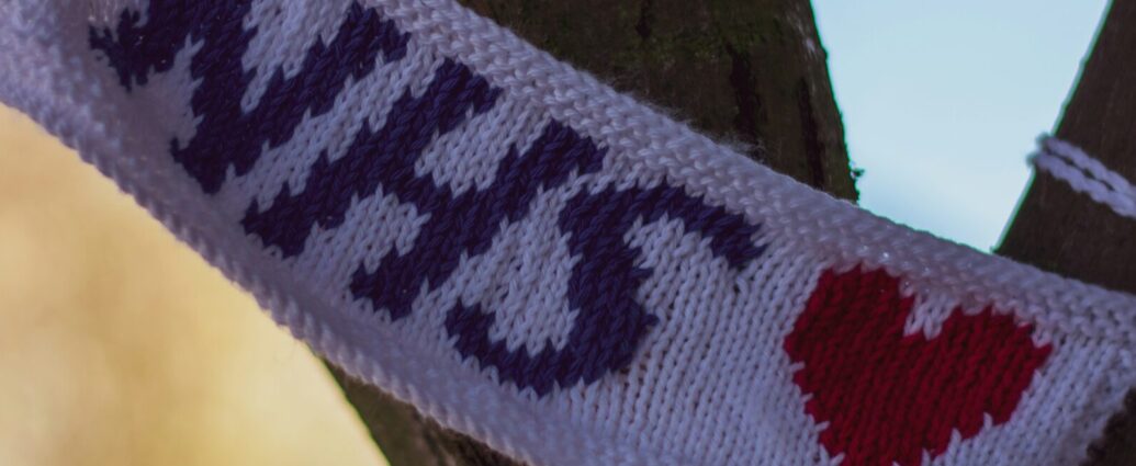 Image of a sign with the letters NSH printed across