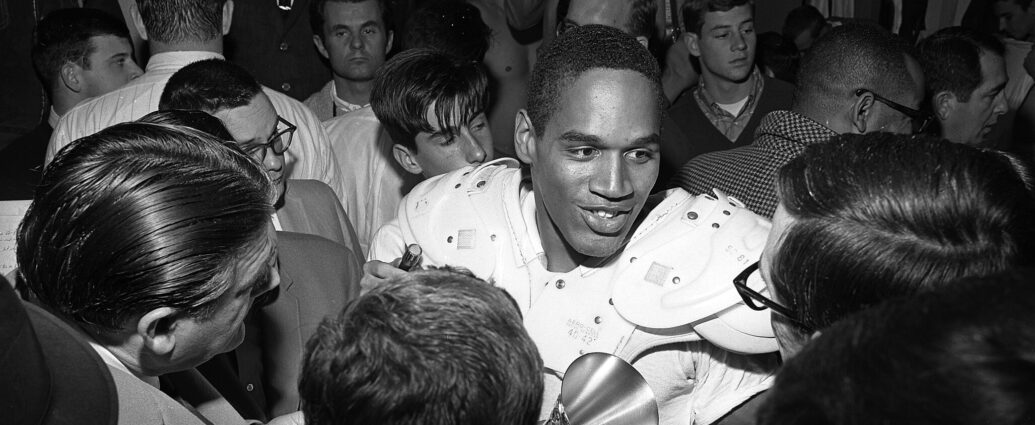 O.J. Simpson is interviewed by the press after leading Trojans to 14-3 Rose Bowl win. Simpson, who gained 128 yards in 25 carries, was named Player of the Game.