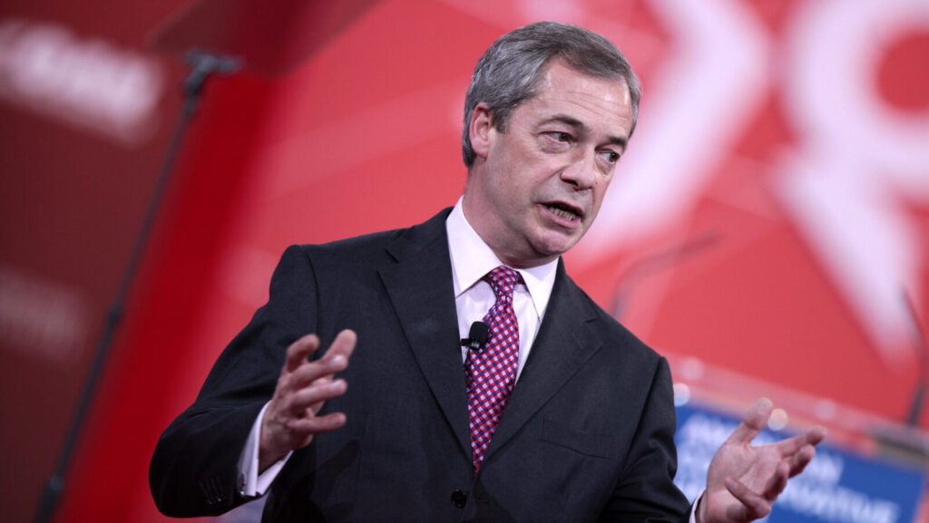 Nigel Farage speaks at a conference. Will the new Reform UK leader make any difference for the residents of Clacton?