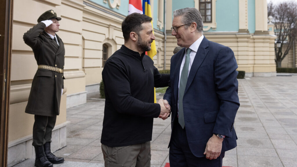 UK Prime Minister Keir Starmer shakes hands with President of Ukraine Volodymyr Zelenskyy