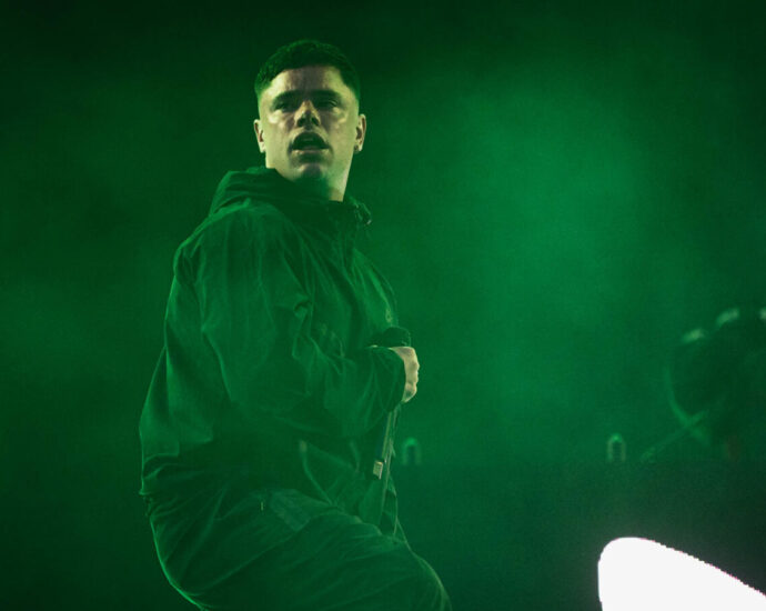 Kneecap performing on stage.